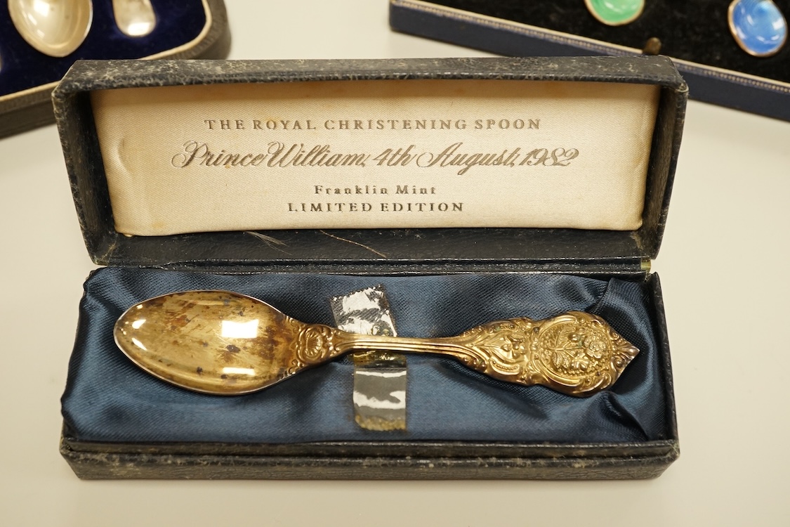 A cased set of six George VI silver teaspoons, James Dixon & Sons, Sheffield, 1948, a cased set of six silver and polychrome enamel coffee spoons and a cased single silver spoon.